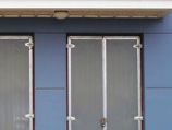Fire door supporting plate